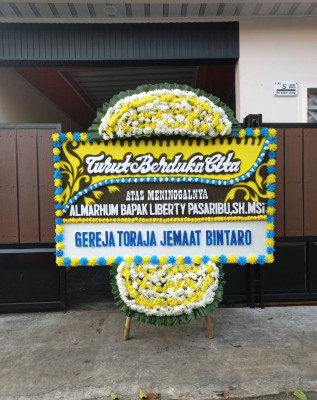 Papan Bunga Duka di Indra Sakti